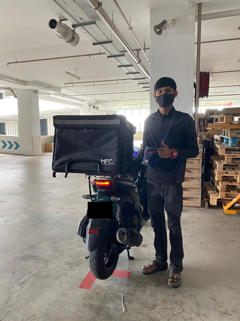 MFC rider with their delivery bag