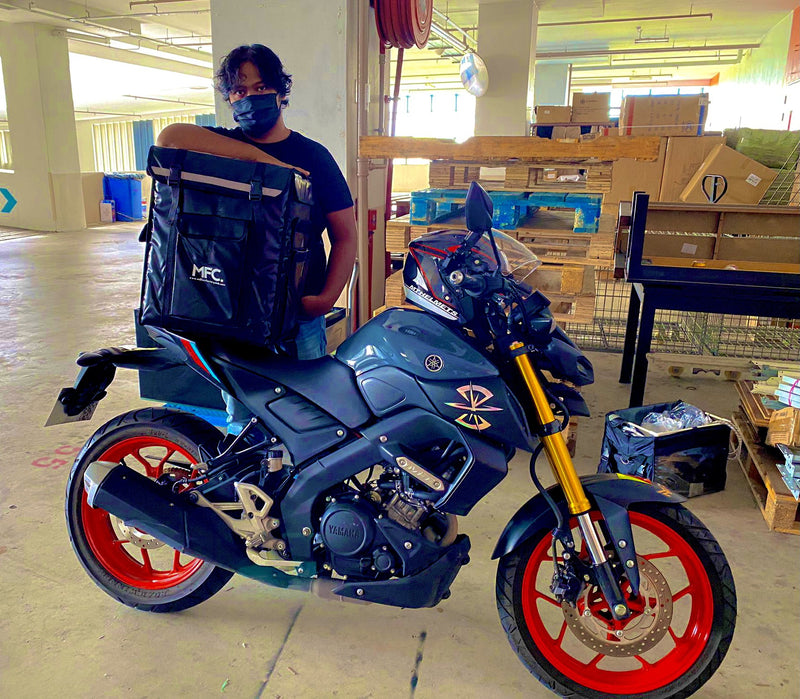 MFC rider with their delivery bag