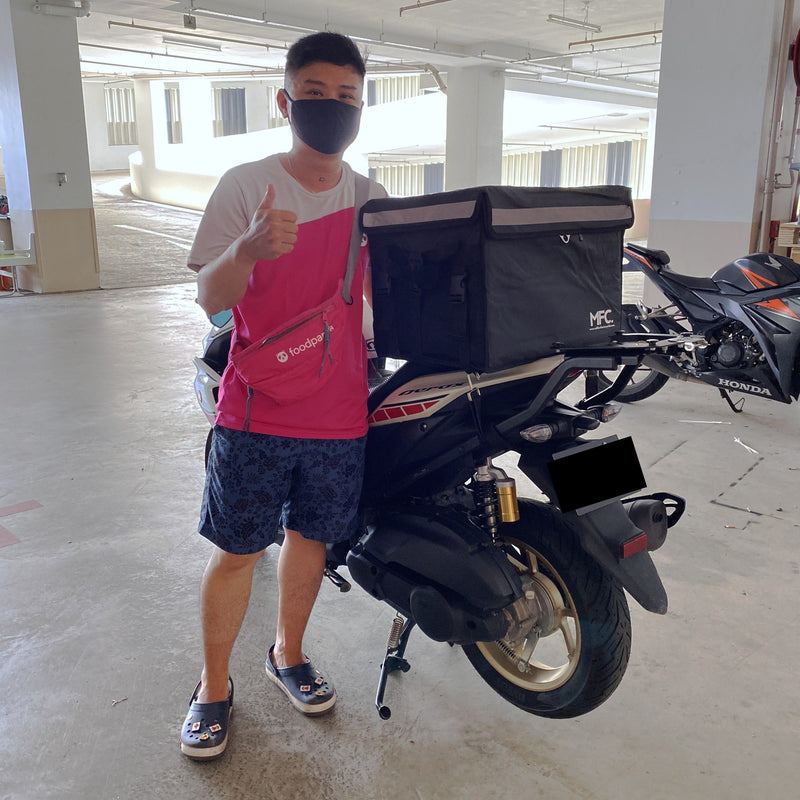 MFC rider with their delivery bag