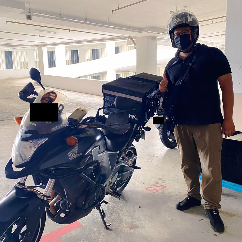 MFC rider with their delivery bag