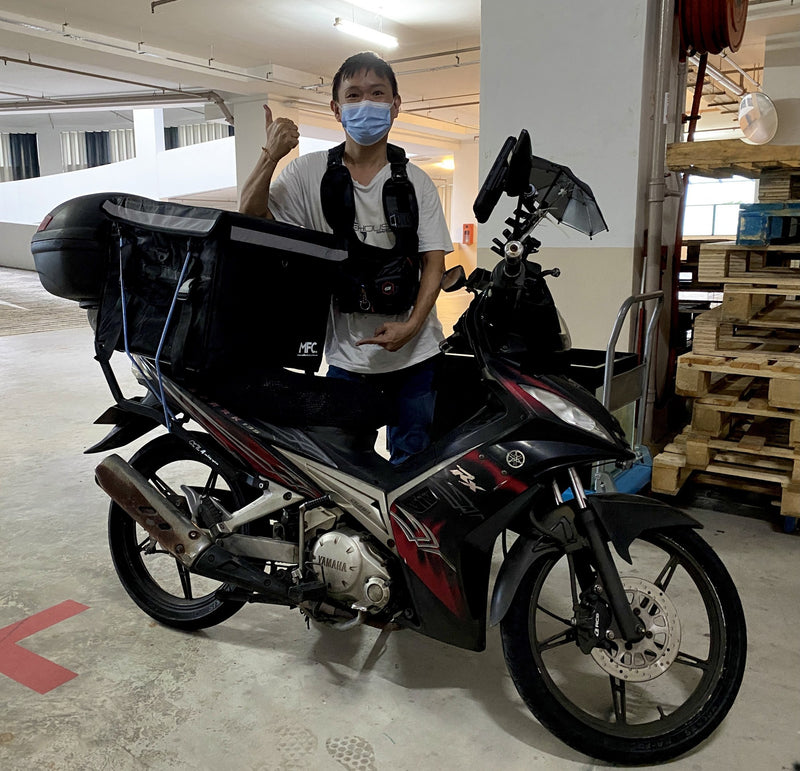 MFC rider with their delivery bag
