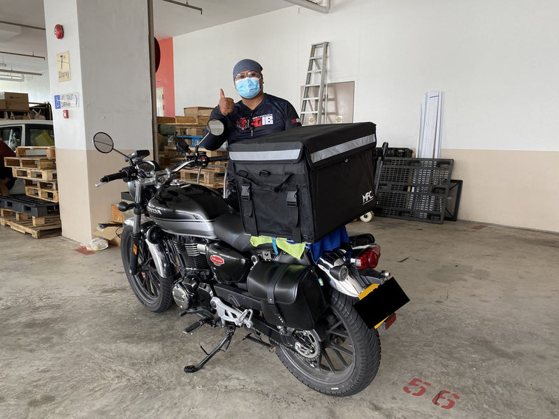 MFC rider with their delivery bag