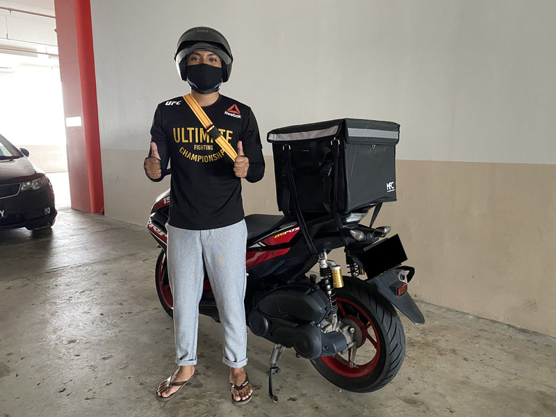 MFC rider with their delivery bag