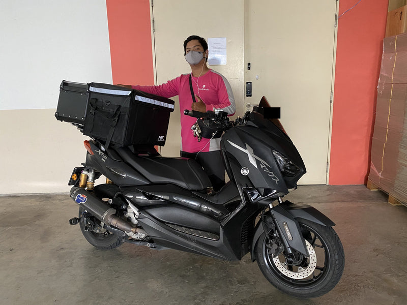 MFC rider with their delivery bag